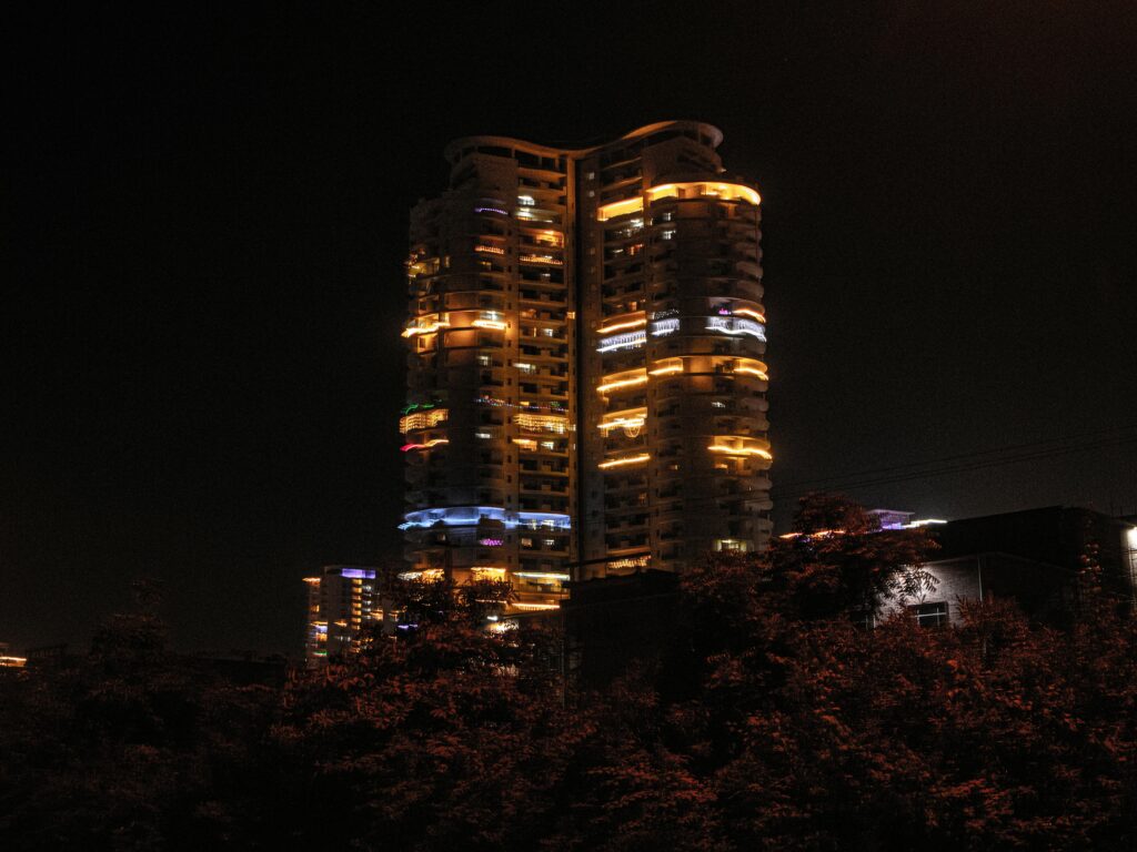 Stunning view of illuminated skyscrapers against the night sky in Gurugram, India.